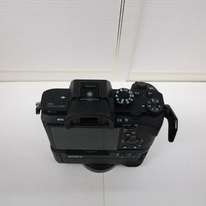 Sony Alpha 7R body and power pack.